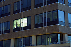 building with office light on at night