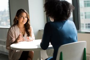 Stay interview between two women